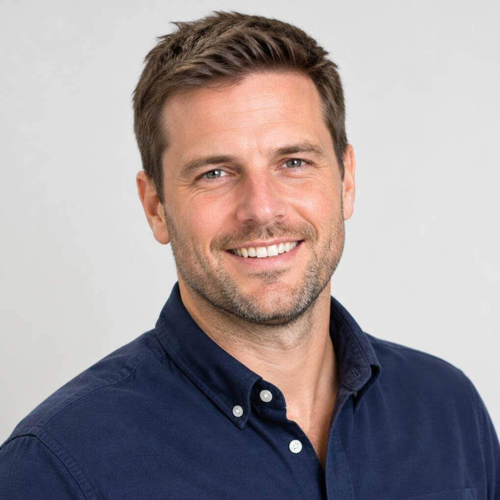 Portrait of a smiling man in his thirties with short hair